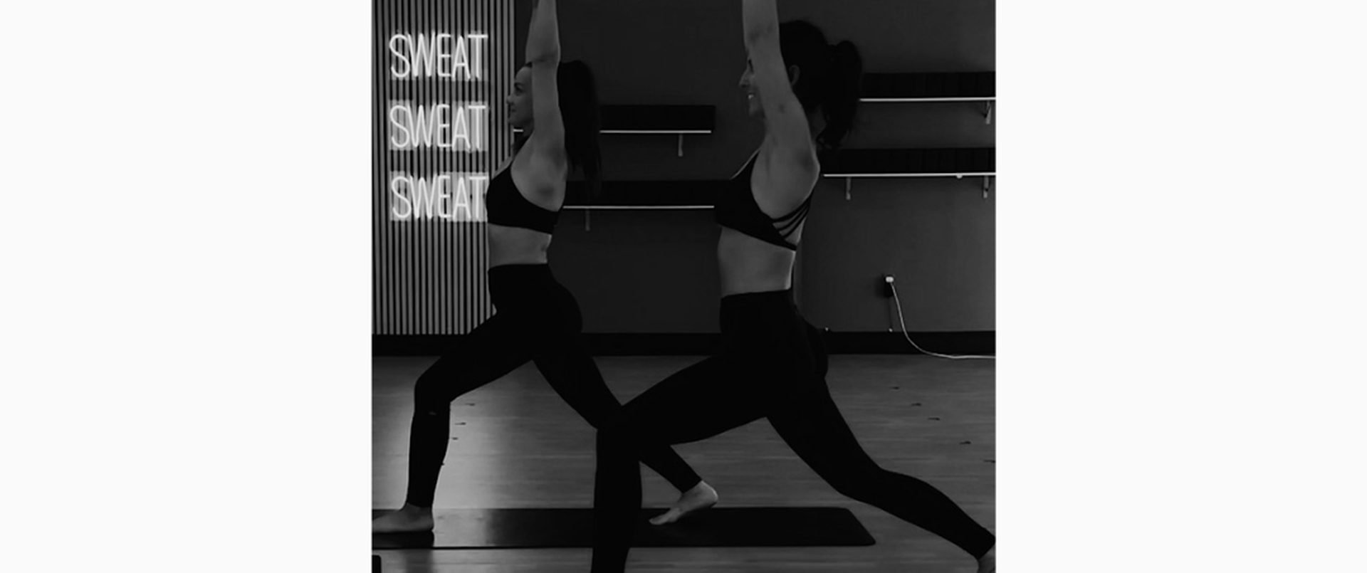 Fire Flow Sculpt & Tone Teacher Training - two instructors with dumbbells